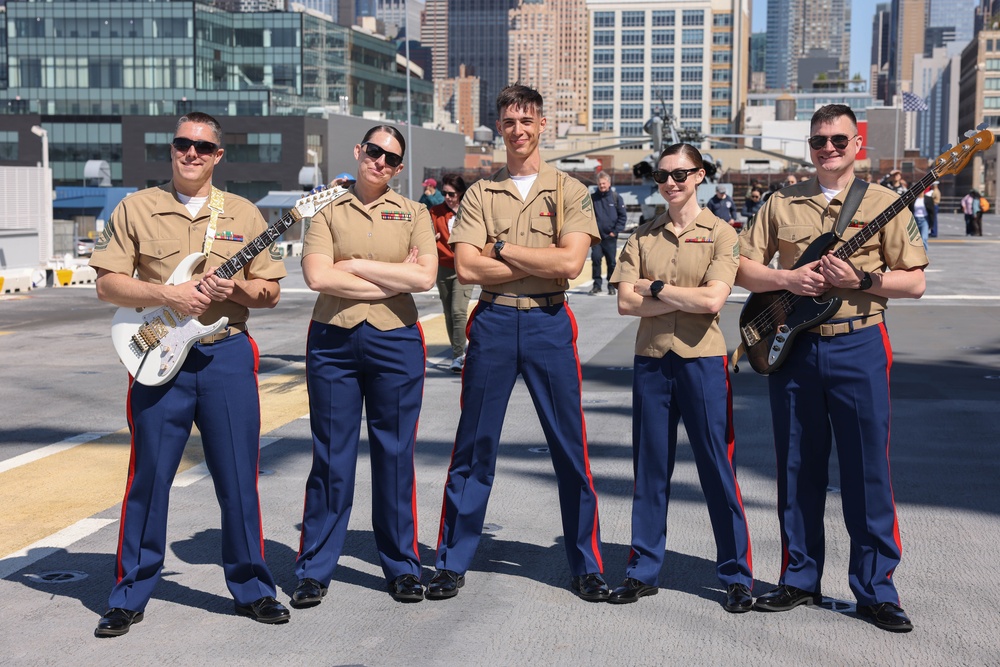 Quantico Marine Rock Band performs aboard the USS WASP (LHD 1) during Fleet Week