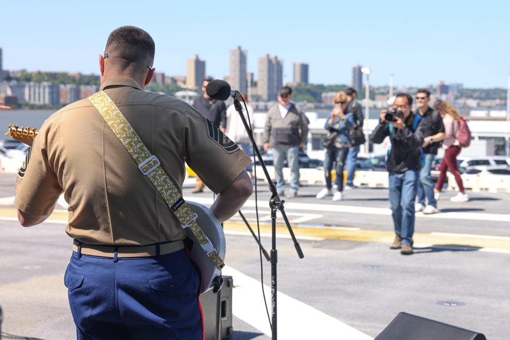 Quantico Marine Rock Band performs aboard the USS WASP (LHD 1) during Fleet Week