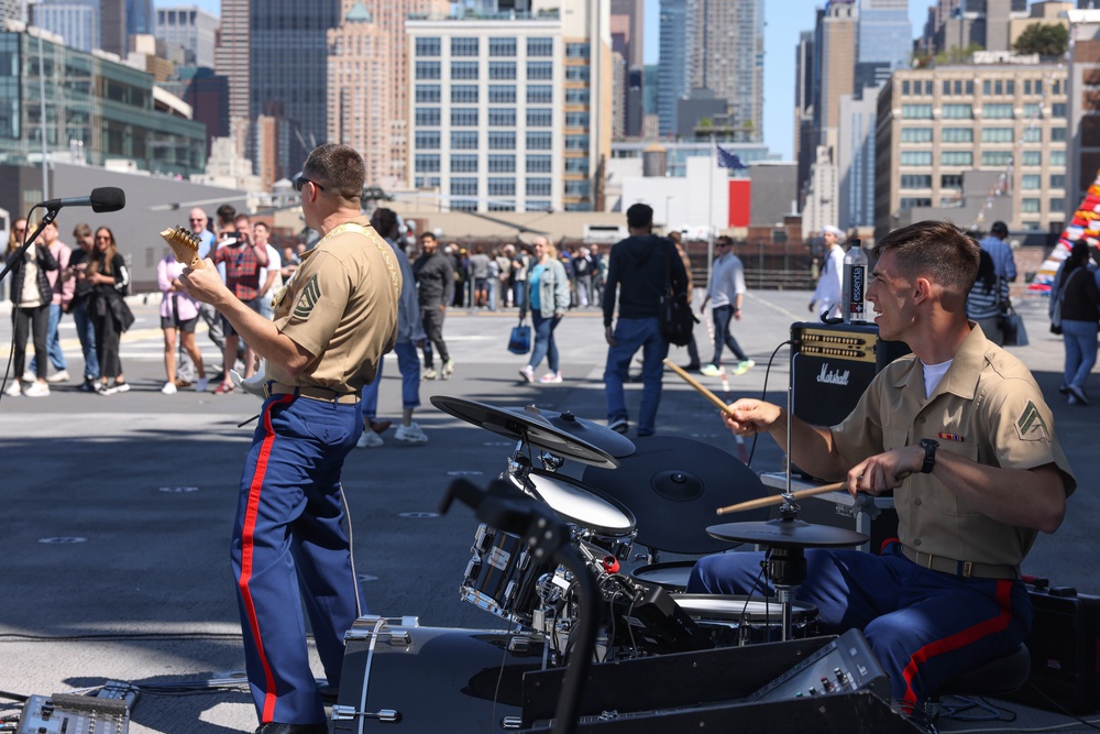 Quantico Marine Rock Band performs aboard the USS WASP (LHD 1) during Fleet Week