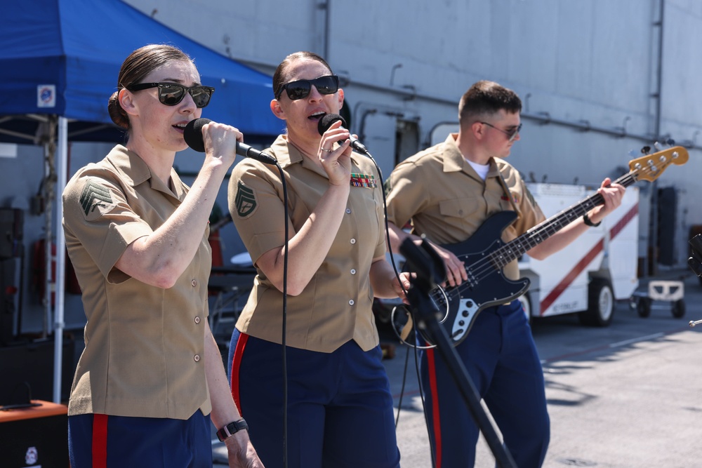 Quantico Marine Rock Band performs aboard the USS WASP (LHD 1) during Fleet Week