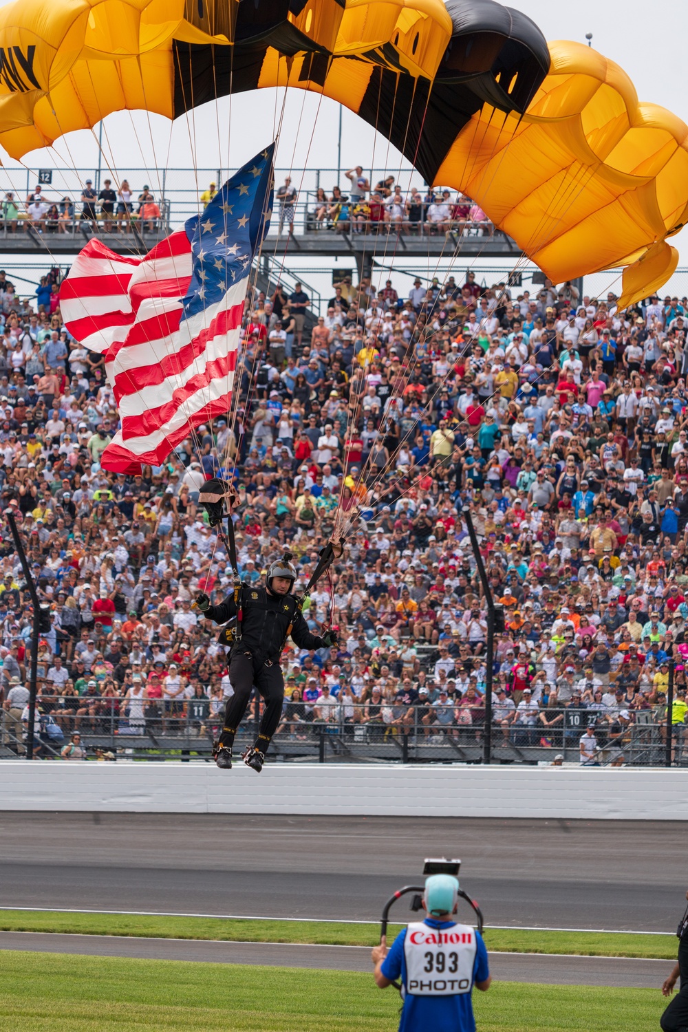 Army Golden Knights make parachute jump with American flag for Indy 500