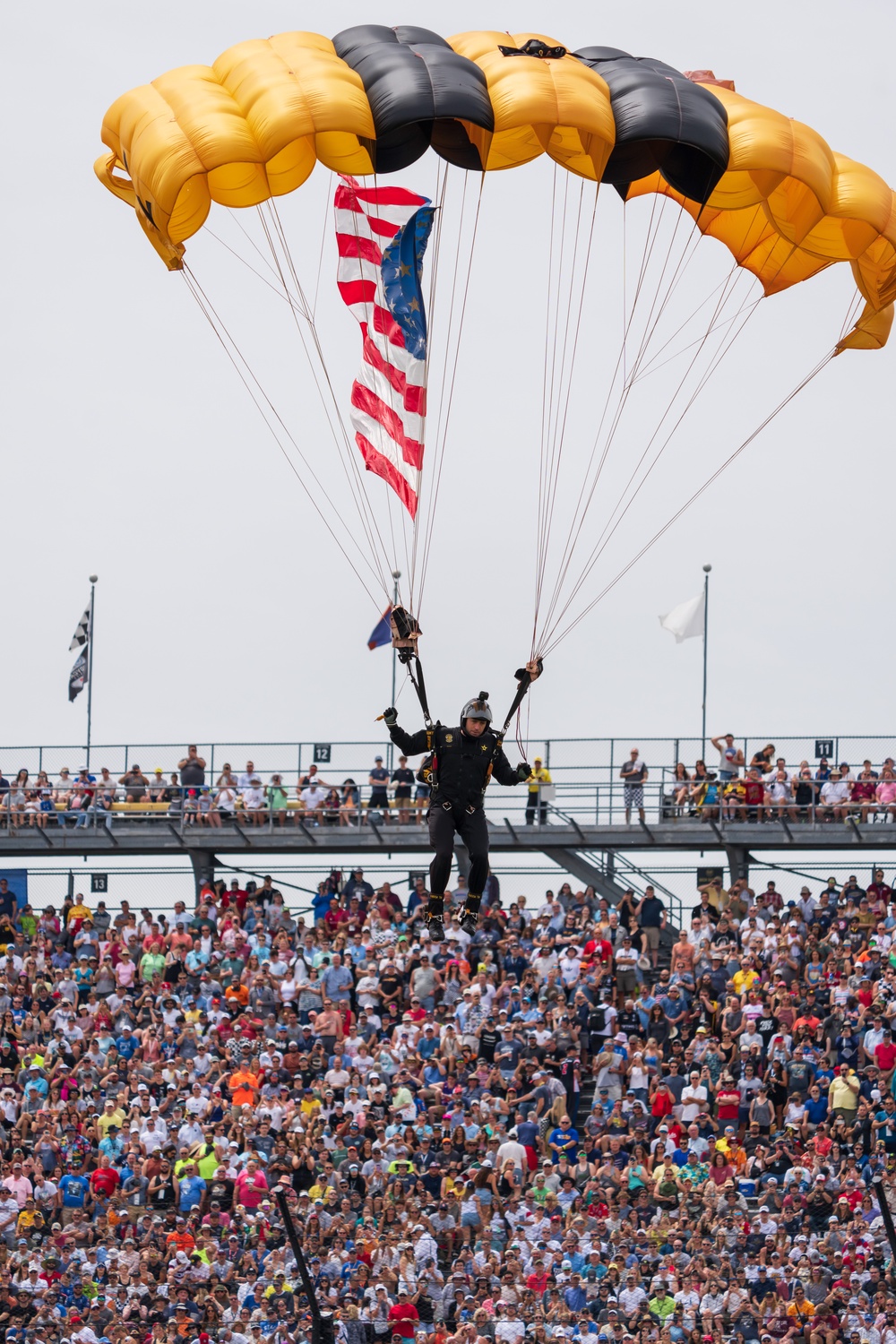 Army Golden Knights make parachute jump with American flag for Indy 500