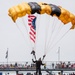 Army Golden Knights make parachute jump with American flag for Indy 500