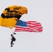 Army Golden Knights make parachute jump with American flag for Indy 500