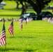 Boy Scouts place flags on unknown graves