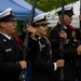 Service members attend the Sunset Sunset Ceremony at the Long Beach Navy Memorial during Los Angeles Fleet Week