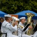 Service members attend the Sunset Sunset Ceremony at the Long Beach Navy Memorial during Los Angeles Fleet Week