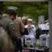 Service members attend the Sunset Sunset Ceremony at the Long Beach Navy Memorial during Los Angeles Fleet Week