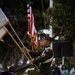 Service members attend the Sunset Sunset Ceremony at the Long Beach Navy Memorial during Los Angeles Fleet Week