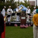 Service members attend the Sunset Sunset Ceremony at the Long Beach Navy Memorial during Los Angeles Fleet Week