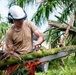 Sailors assigned to NMCB1 and SRT1 Work to Clear Fuel Depot Roads Following Typhoon Mawar