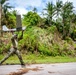 Sailors assigned to NMCB1 and SRT1 Work to Clear Fuel Depot Roads Following Typhoon Mawar