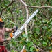 Sailors assigned to NMCB1 and SRT1 Work to Clear Fuel Depot Roads Following Typhoon Mawar