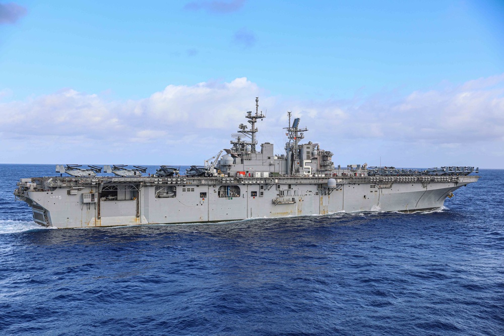 USS Carter Hall Sails Alongside USS Bataan During COMPTUEX