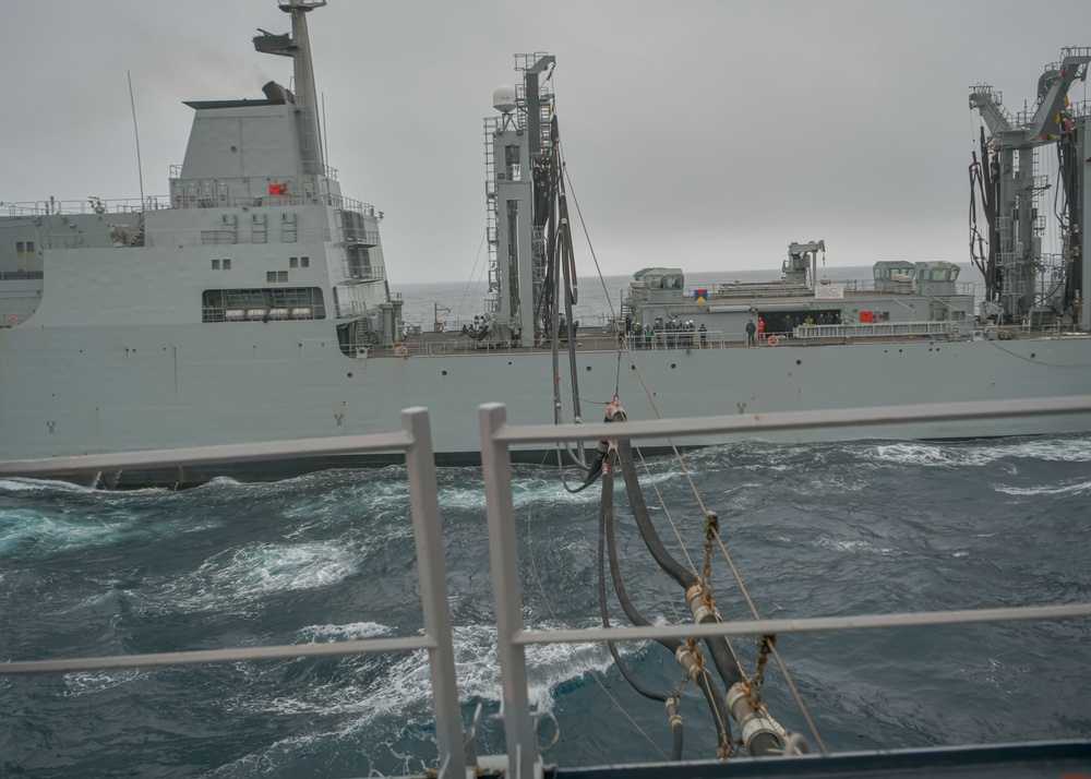 USS Oscar Austin (DDG 79) conducts replenishment-at-sea during Formidable Shield 2023