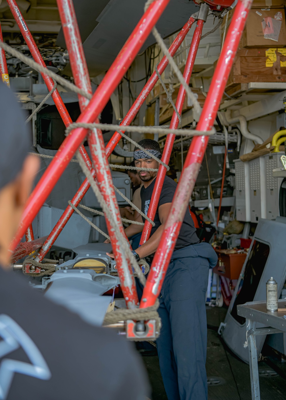 Helicopter Maritime Strike Squadron 50 members conduct repairs on the H-60 Romeo during Exercise Formidable Shield 2023