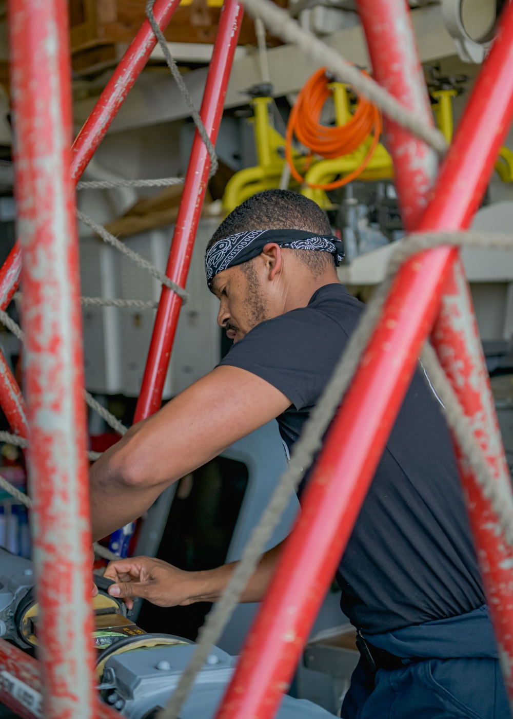 Helicopter Maritime Strike Squadron 50 members conduct repairs on the H-60 Romeo during Exercise Formidable Shield 2023