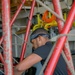 Helicopter Maritime Strike Squadron 50 members conduct repairs on the H-60 Romeo during Exercise Formidable Shield 2023
