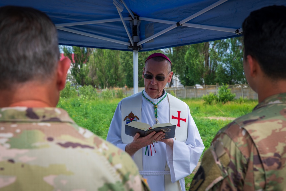 Soldiers in the field during Defender Europe - Saber Guardian attend rare traditional Catholic Mass