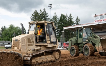 The Oregon National Guard assist Centennial High School with construction on new athletic field