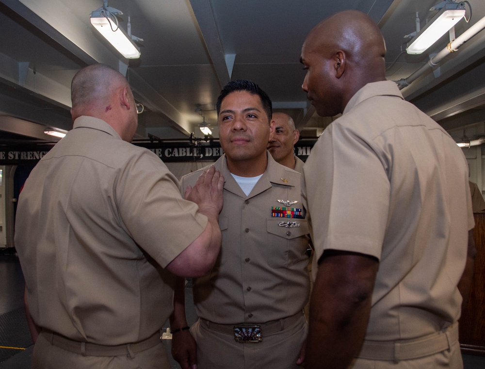 USS Ronald Reagan (CVN 76) pins newly selected Master Chief Petty Officer and Senior Chief Petty Officers