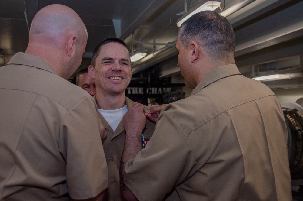 USS Ronald Reagan (CVN 76) pins newly selected Master Chief Petty Officer and Senior Chief Petty Officers