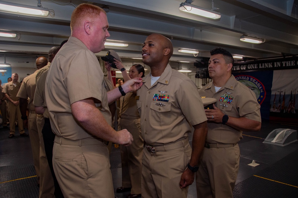 USS Ronald Reagan (CVN 76) pins newly selected Master Chief Petty Officer and Senior Chief Petty Officers