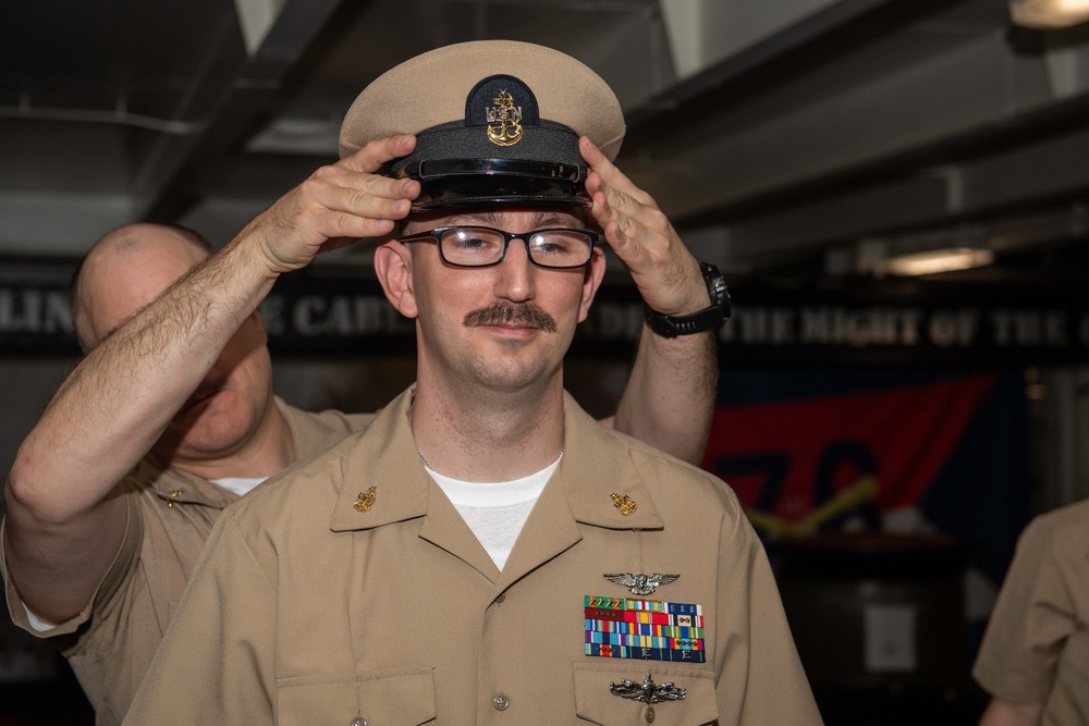 USS Ronald Reagan (CVN 76) pins newly selected Master Chief Petty Officer and Senior Chief Petty Officers