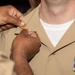 USS Ronald Reagan (CVN 76) pins newly selected Master Chief Petty Officer and Senior Chief Petty Officers