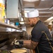 USS Ronald Reagan (CVN 76) Sailors prepare food