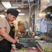 USS Ronald Reagan (CVN 76) Sailors prepare food