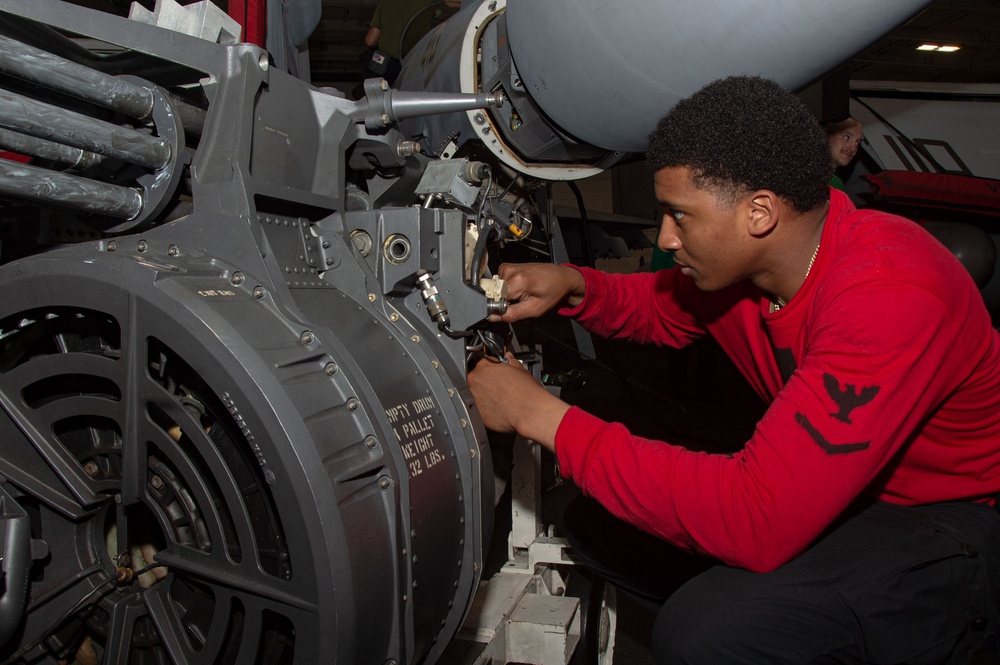 USS Ronald Reagan (CVN 76) Sailors conduct aircraft maintenance