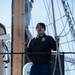 USCGC Eagle crew member at sail station