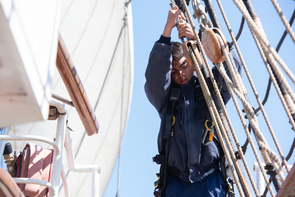 Crew member aboard USCGC Eagle stands watch