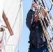 Crew member aboard USCGC Eagle stands watch
