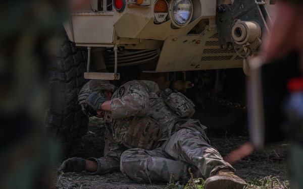 US Soldier Attaches Towing Equipment