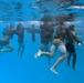 Servicemembers participate in Marine Corps Instructor of Water Survival course