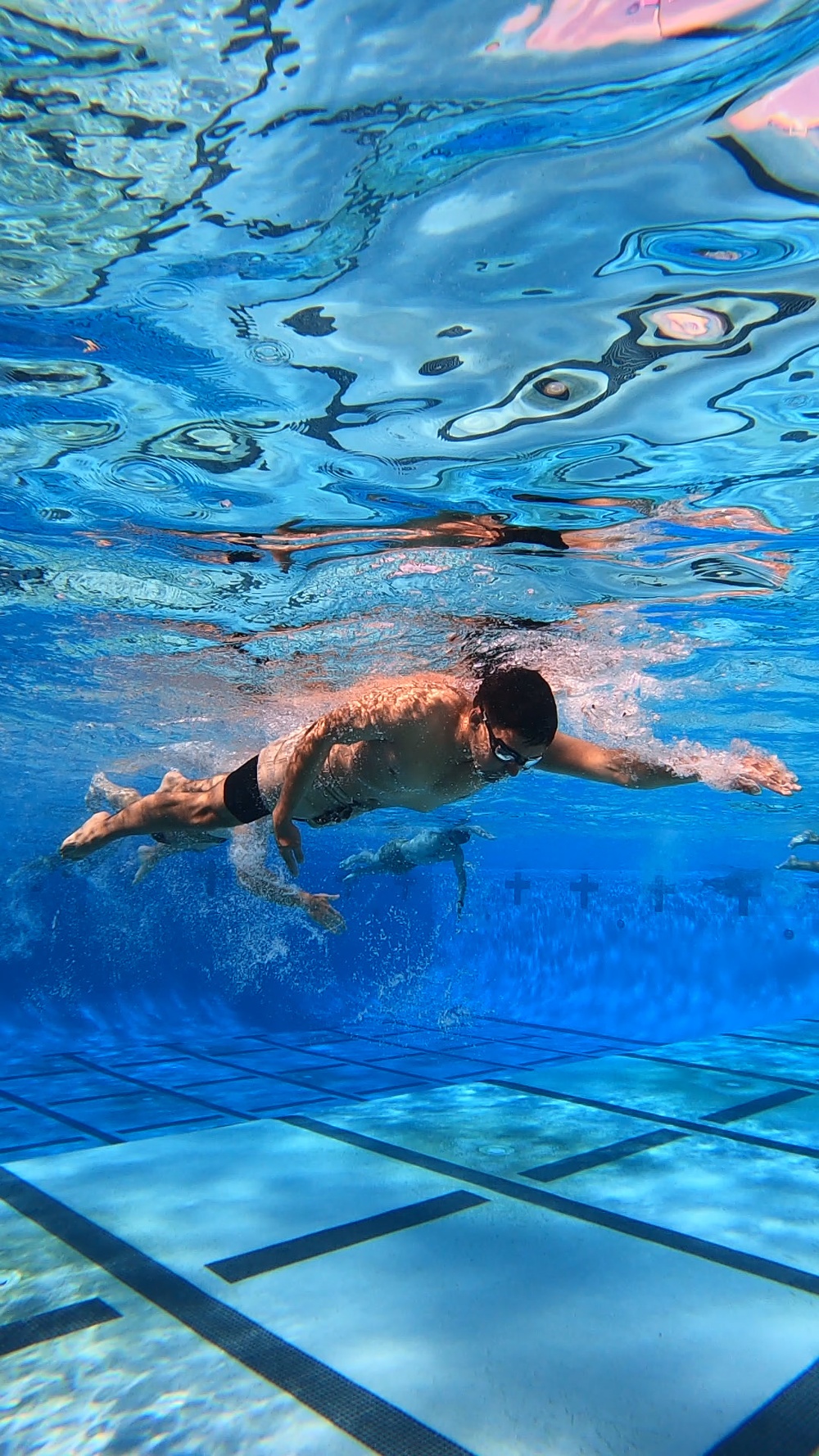 Servicemembers participate in Marine Corps Instructor of Water Survival course