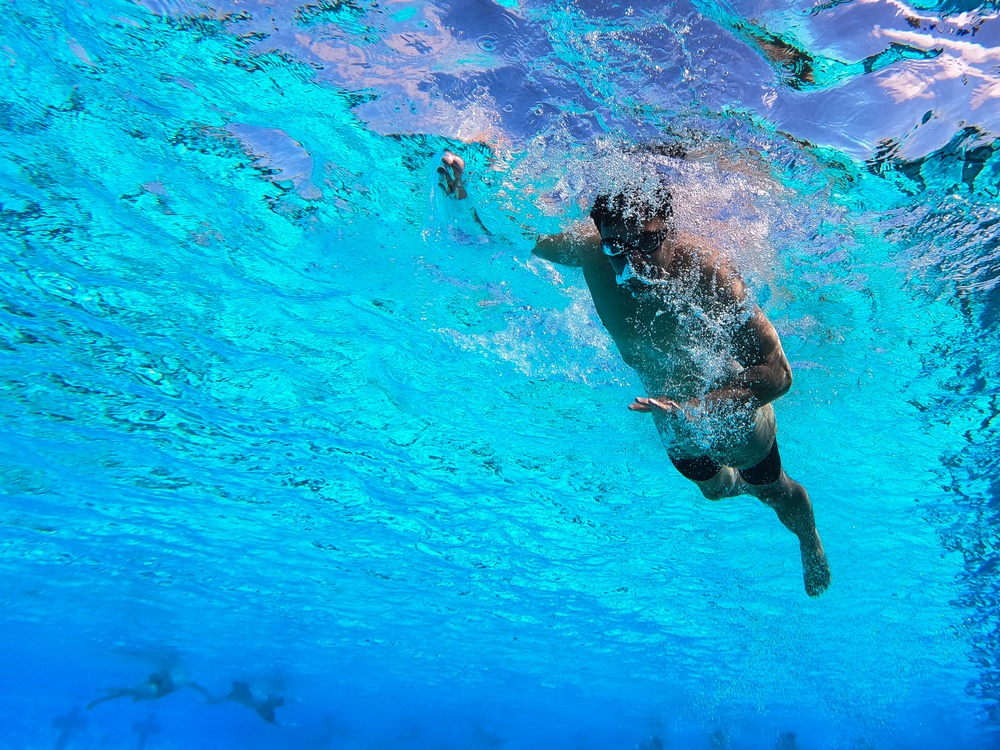 Servicemembers participate in Marine Corps Instructor of Water Survival course