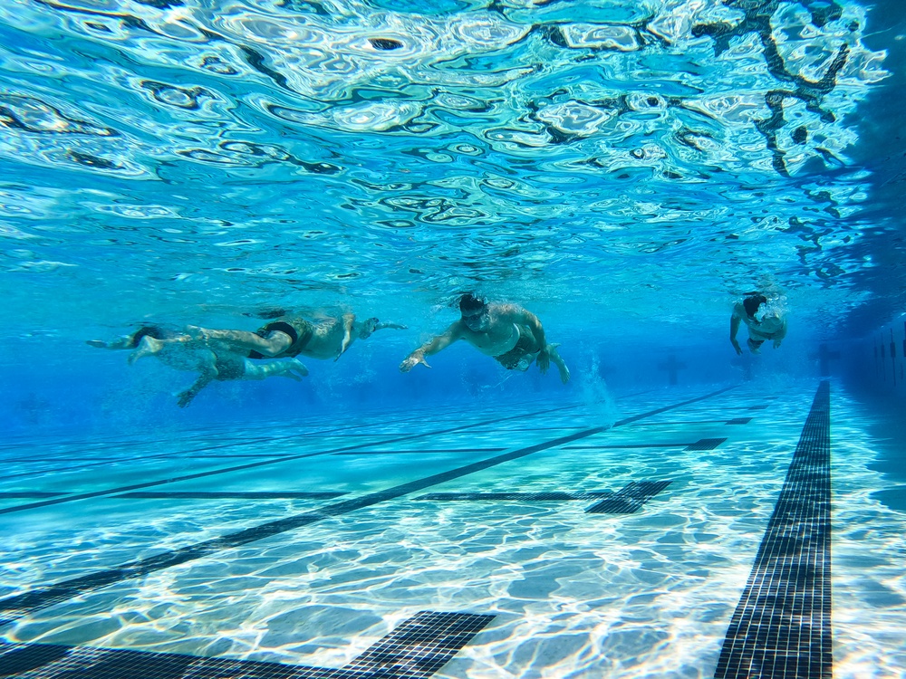 Servicemembers participate in Marine Corps Instructor of Water Survival course