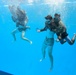 Servicemembers participate in Marine Corps Instructor of Water Survival course