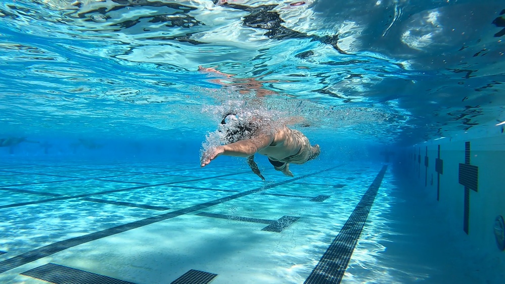 Servicemembers participate in Marine Corps Instructor of Water Survival course