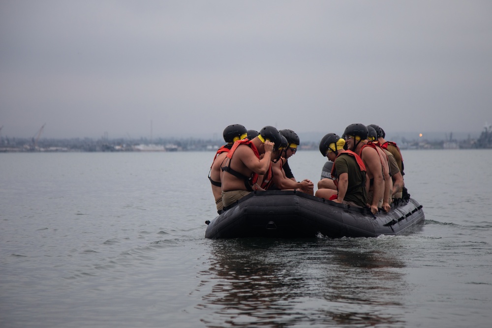 Servicemembers perform simulated rescues in Marine Corps Instructor of Water Survival course