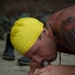 Servicemembers perform simulated rescues in Marine Corps Instructor of Water Survival course