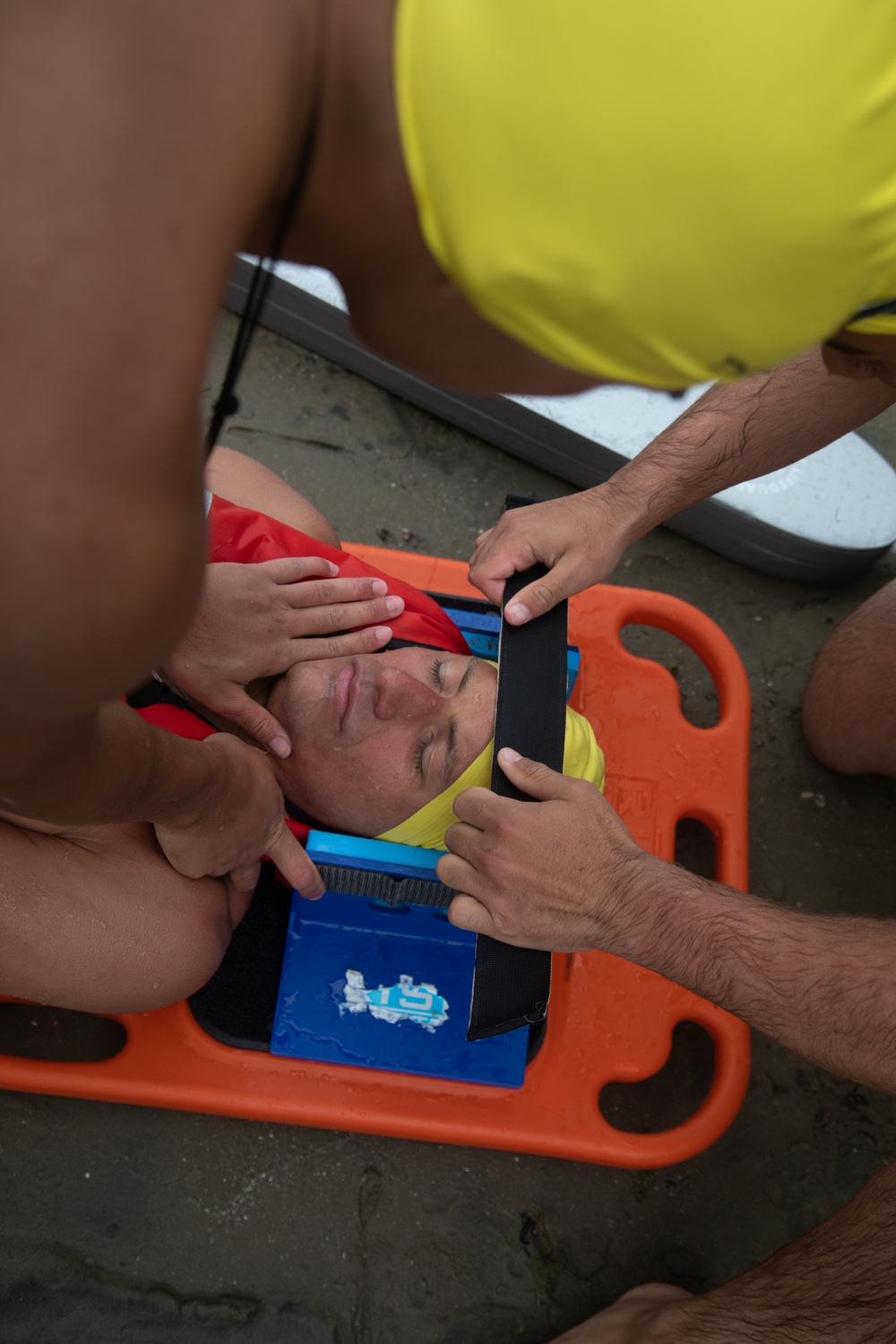 Servicemembers perform simulated rescues in Marine Corps Instructor of Water Survival course