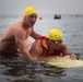 Servicemembers perform simulated rescues in Marine Corps Instructor of Water Survival course