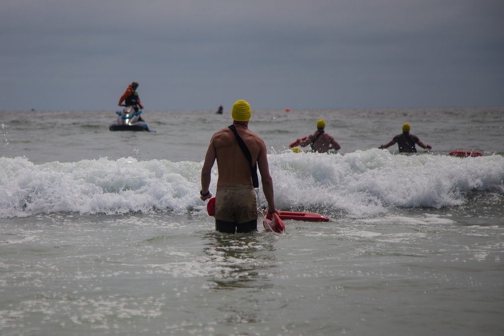 Servicemembers perform simulated rescues in Marine Corps Instructor of Water Survival course