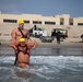 Servicemembers perform simulated rescues in Marine Corps Instructor of Water Survival course