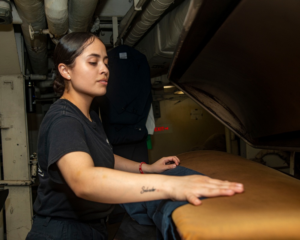U.S Navy Sailor Irons Laundry