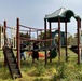 Pax Volunteers Dismantle Aging Equipment for New Playground Construction at Pax